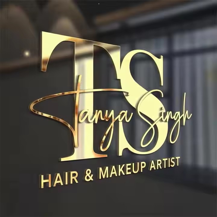 Gold script sign for a hair salon